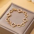 JOSSLYN by wall to wall - Pave Crystal Clover Link Bracelet With Toggle Clasp| 80B1781: Gold