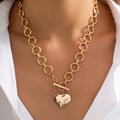 JOSSLYN by wall to wall - NOTABLE HAMMERED HEART FRONT TOGGLE NECKLACE | 40NK9476: GOLD